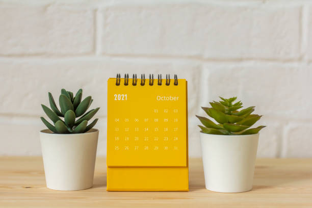 istock Calendar with tear-off sheets for October 2021. A desktop calendar for planning, organizing and managing each date. 1343230270