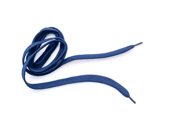 Dark-blue, blue shoelaces isolated on white, crumpled laces, top view Dark-blue, blue shoelaces isolated on white, crumpled laces, top view shoelace stock pictures, royalty-free photos & images