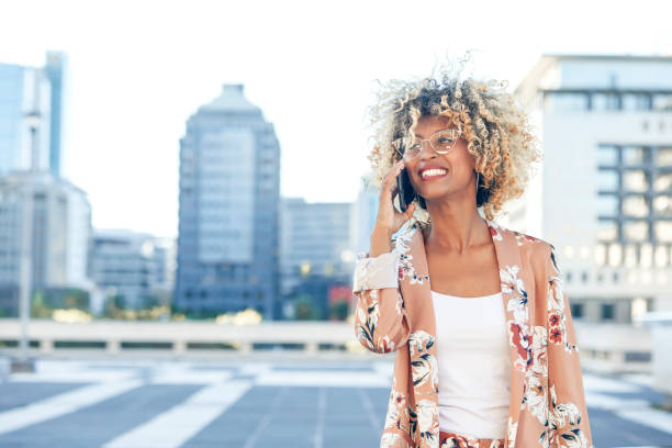 istock Young woman talking on her phone 1343233567