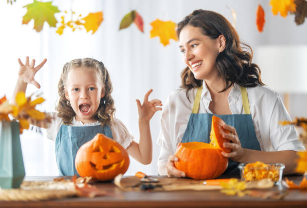 istock family preparing for Halloween 1343234002