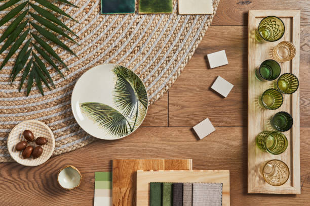 istock Flat lay of creative architect moodboard composition with samples of building, orange textile and natural materials and personal accessories. Top view, template. 1343238957