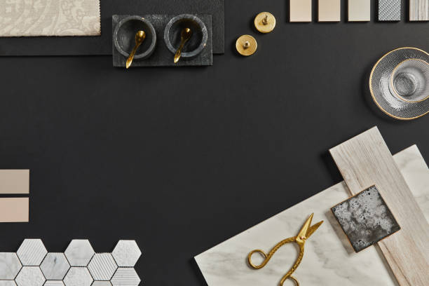 istock Flat lay composition of creative black architect moodboard with samples of building, textile and natural materials and personal accessories. Top view, black background, template. 1343239014