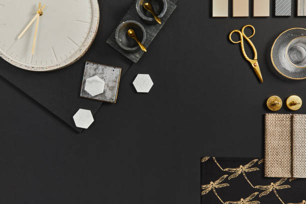 istock Flat lay composition of creative black architect moodboard with samples of building, textile and natural materials and personal accessories. Top view, black background, template. 1343239088