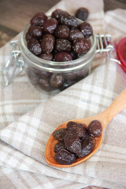 black round buttery olives with a stone