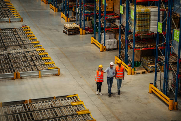 istock Warehouse coworkers meeting with supervisor 1343262232