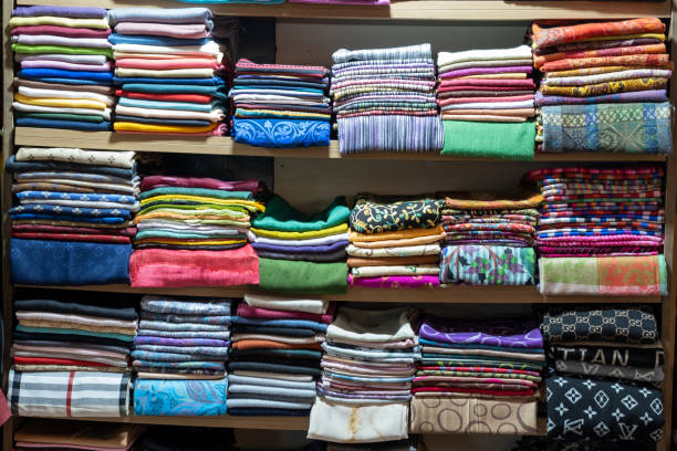istock fabrics lined up in a shop window 1343262634