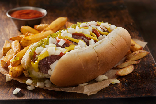 The All American Hamburger Dog with Ketchup, Mustard, Relish, Onions and French Fries
