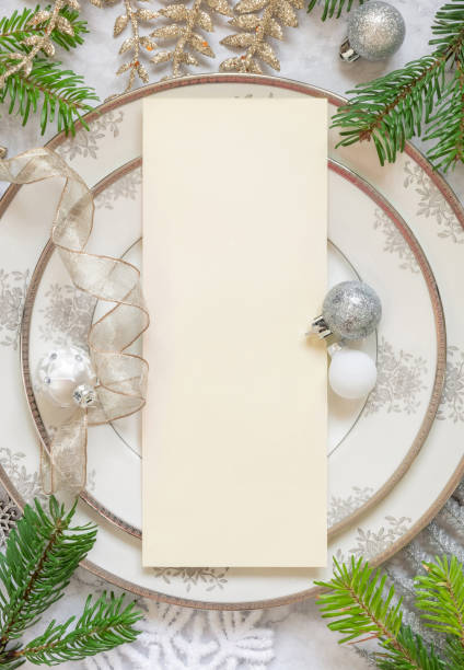 istock Festive table setting of with fir tree branches and Christmas decorations. Mockup 1343265018