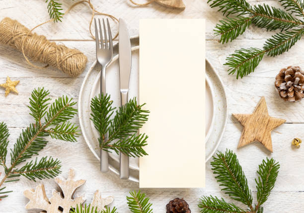 istock Festive table setting with fir tree branches. Mockup of Christmas or New Year menu card 1343265019