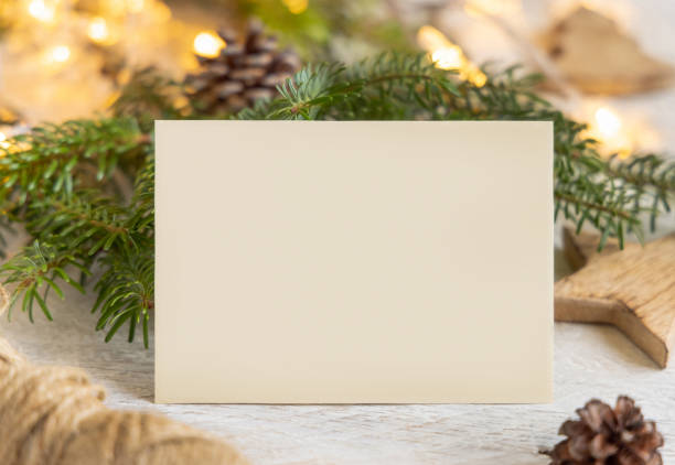 istock Christmas Composition with a blank card and fir branches. Holiday mockup 1343265022