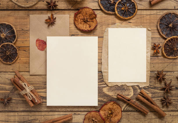 istock Christmas Composition with a blank cards and envelope on wooden table flat lay 1343265034