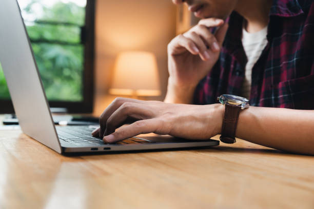 istock Asian businessman working at home 1343265483