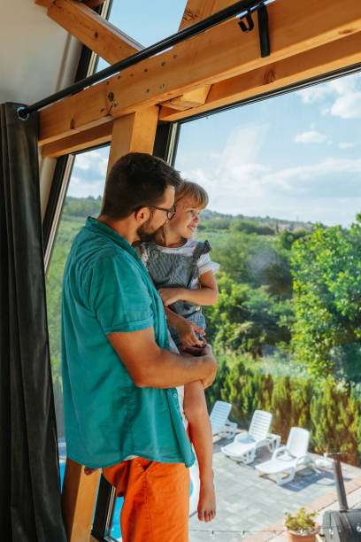 istock Young father spending time with her daughter at home 1343265518