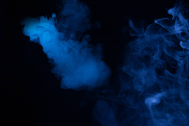 istock Blue and pink steam on a black background. 1343267482