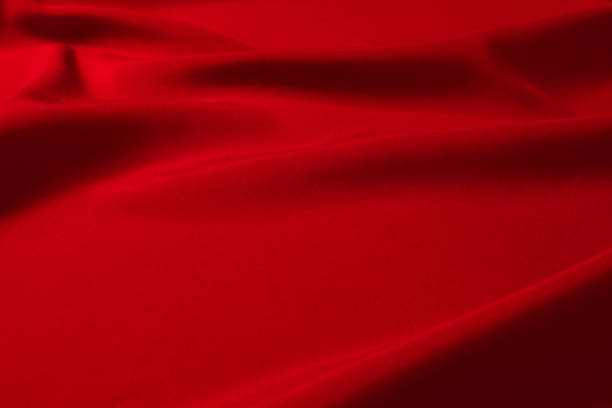 istock Red silk or satin luxury fabric texture can use as abstract background. Top view. 1343267528