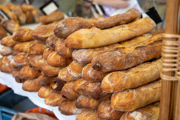 istock French bakery, many fresh baked baguettes breads ready for sale 1343269802
