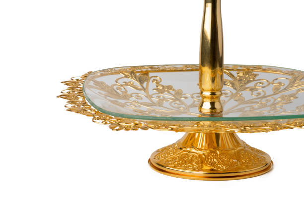 istock Oriental golden cake stand isolated on white background 1343278602