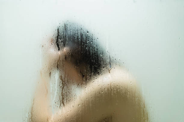 istock Asian woman talking a shower. 1343279697