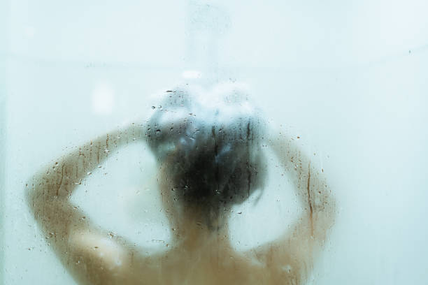 istock Asian woman talking a shower. 1343280950