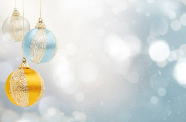 istock christmas balls on a blue background with particles 1343283763
