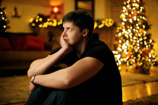istock Lonely young man bored on new years eve 1343285931