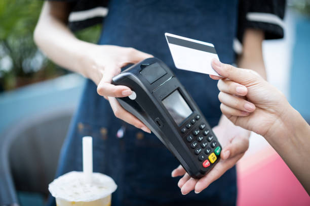 istock Make contactless payments with a credit card at the store 1343286390