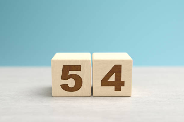 istock Wooden toy blocks forming the number 54. 1343286633