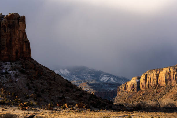 istock Morning Light Breaks Through Snow Clouds Near Moab 1343287369