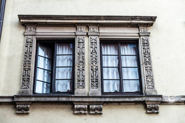 istock Two windows of an old classic building 1343288723