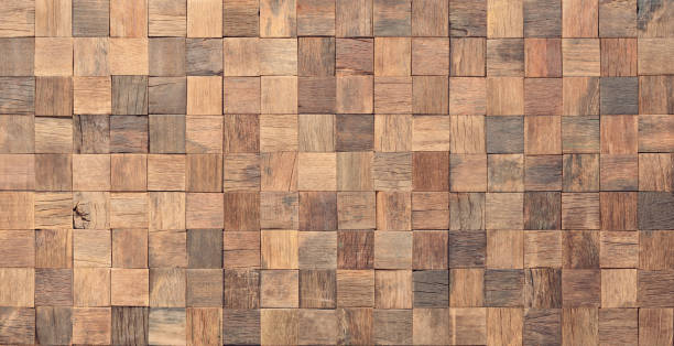 istock surface of wall panel made boards as a background. brown wood texture 1343289056
