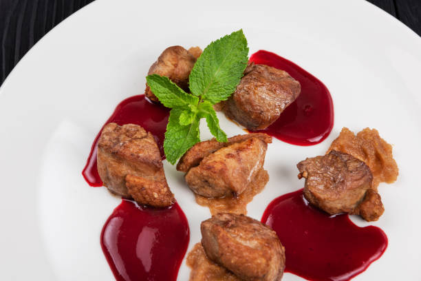 istock Fried pork meat with zucchini puree 1343289337
