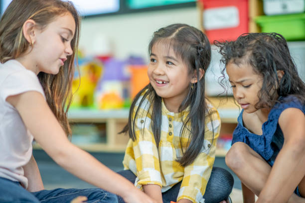 istock Preschool Children Playing on the Floor Together 1343292614