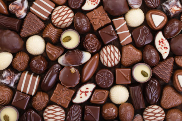 istock mix chocolate candy, sweet snack, food background. 1343294918
