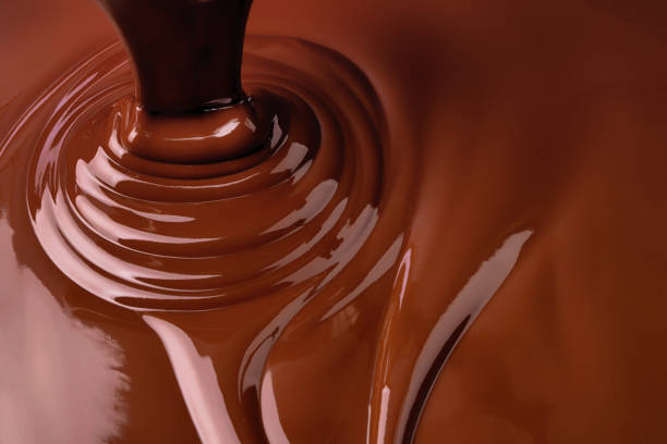istock swirl stream chocolate, liquid sauce or sweet cocoa syrup 1343294952