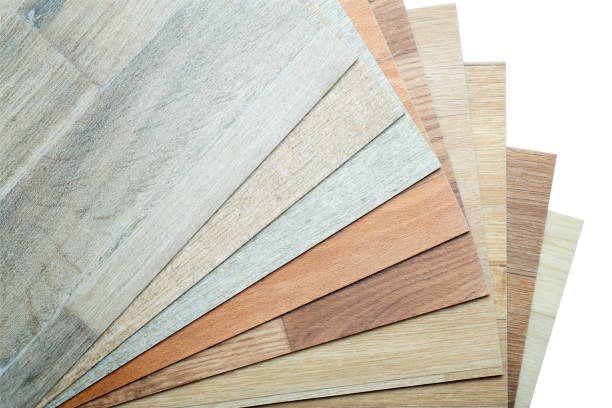 istock Vinyl and linoleum samples on a white isolated background. Vinyl for flooring with wood grain texture and pattern. 1343297370