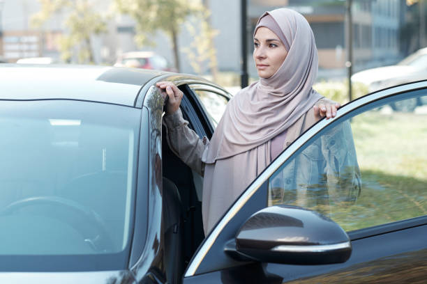 istock Woman With Car Door Opened 1343299858