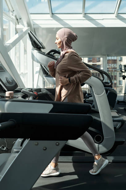 istock Woman Running On Treadmill 1343299891