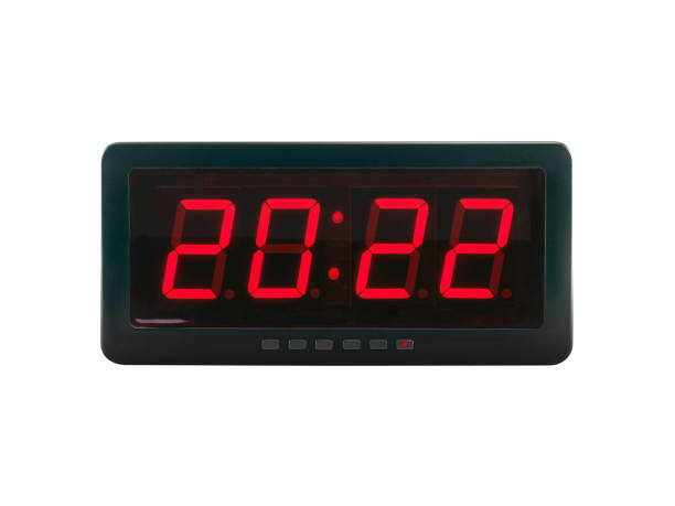 istock close-up red led light numbers 2022 illuminated on black digital electric alarm clock display isolated on white background 1343300766