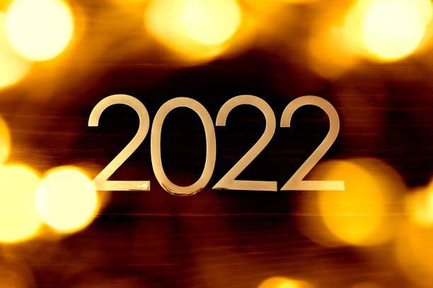 istock 2022 New Year and Christmas celebration. Composition with numbers and blurry lights 1343301347