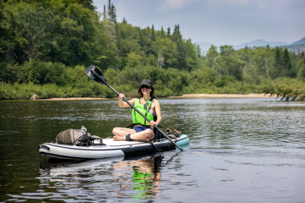 istock Woman paddleboarding and kayaking on the River in Summer 1343302443