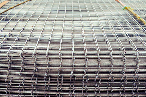 Construction grid for fencing and reinforcement of structures, close-up