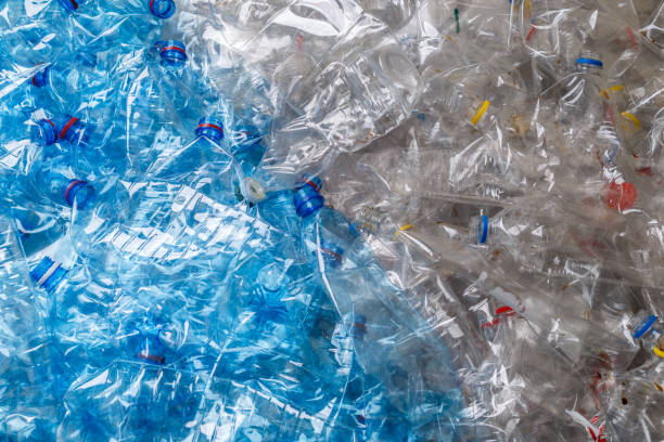 istock plastic bottles. recycling To conserve the environment concept.Background of many used empty PET bottles 1343304364
