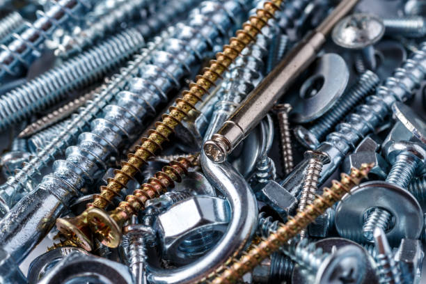 mixed screws and nails. industrial background. home improvement.bolts and nuts.close-up of various screws. use for background, top view. - fastening imagens e fotografias de stock