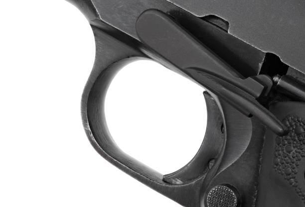 istock Takedown lever rotating on a semi auto handgun 1343305502