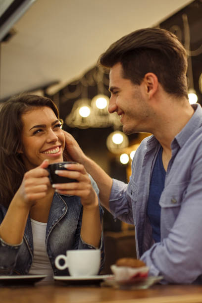 istock Couple having a bonding moment during a coffee date 1343306246
