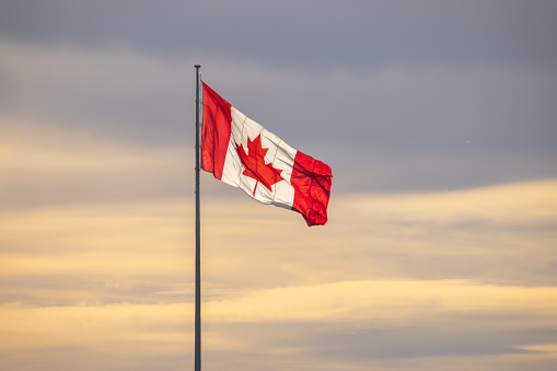 Calgary, Alberta, Canada. Sep 21, 2021. A Canadian Flag on a flagpole