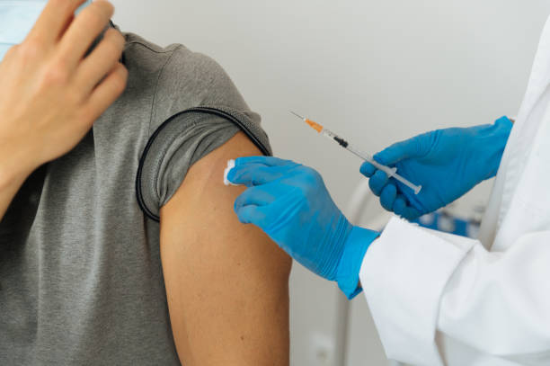 istock Crop doctor preparing patient for vaccination 1343312036