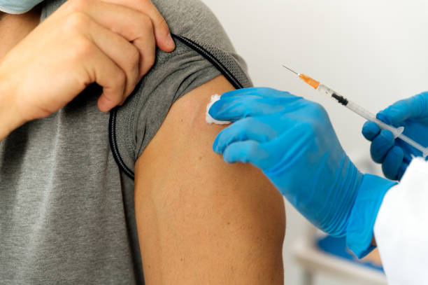 istock Crop doctor preparing patient for vaccination 1343312041