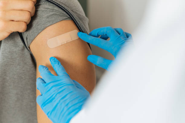 istock Crop doctor sticking patch after vaccination 1343312563