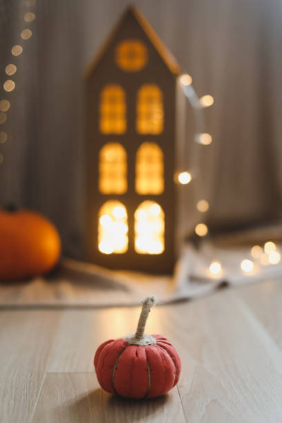 istock halloween and autumn cozy composition with pumpkins, october home decoration 1343312627